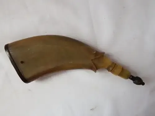 Antique gunpowder horn in the shape of a fish