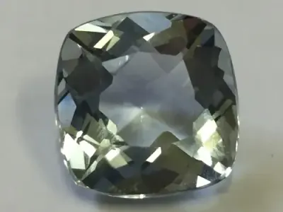 Scapolite of 16.4 carat - Cushion cut light blue - With gem lab certificate