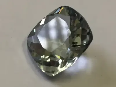 Scapolite of 16.4 carat - Cushion cut light blue - With gem lab certificate
