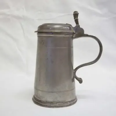 Antique pewter stein marked M.T on lid with plumed thumb piece