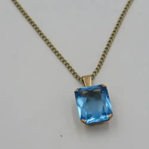 9kt Gold pendant with blue Quartz &amp; gold necklace-clasp not gold - weighs 4.5g - length 48cm