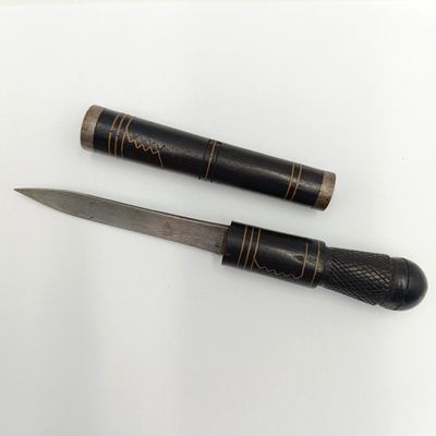 Antique wood with brass inlay dagger