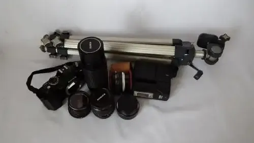 Konica FS - 1 camera with Konica Hexanon AR 50mm F1.7 lens-with 3 lenses,book and tripod in bag