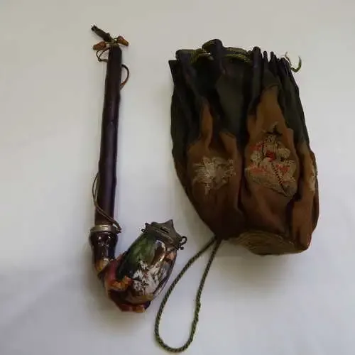 Long stemmed German pipe with lovely leather and embroidery tobacco pouch