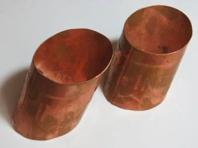 Pair of WW2 POW Internment Camp Andalusia 1940 trench art copper napkin rings