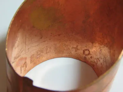 Pair of WW2 POW Internment Camp Andalusia 1940 trench art copper napkin rings