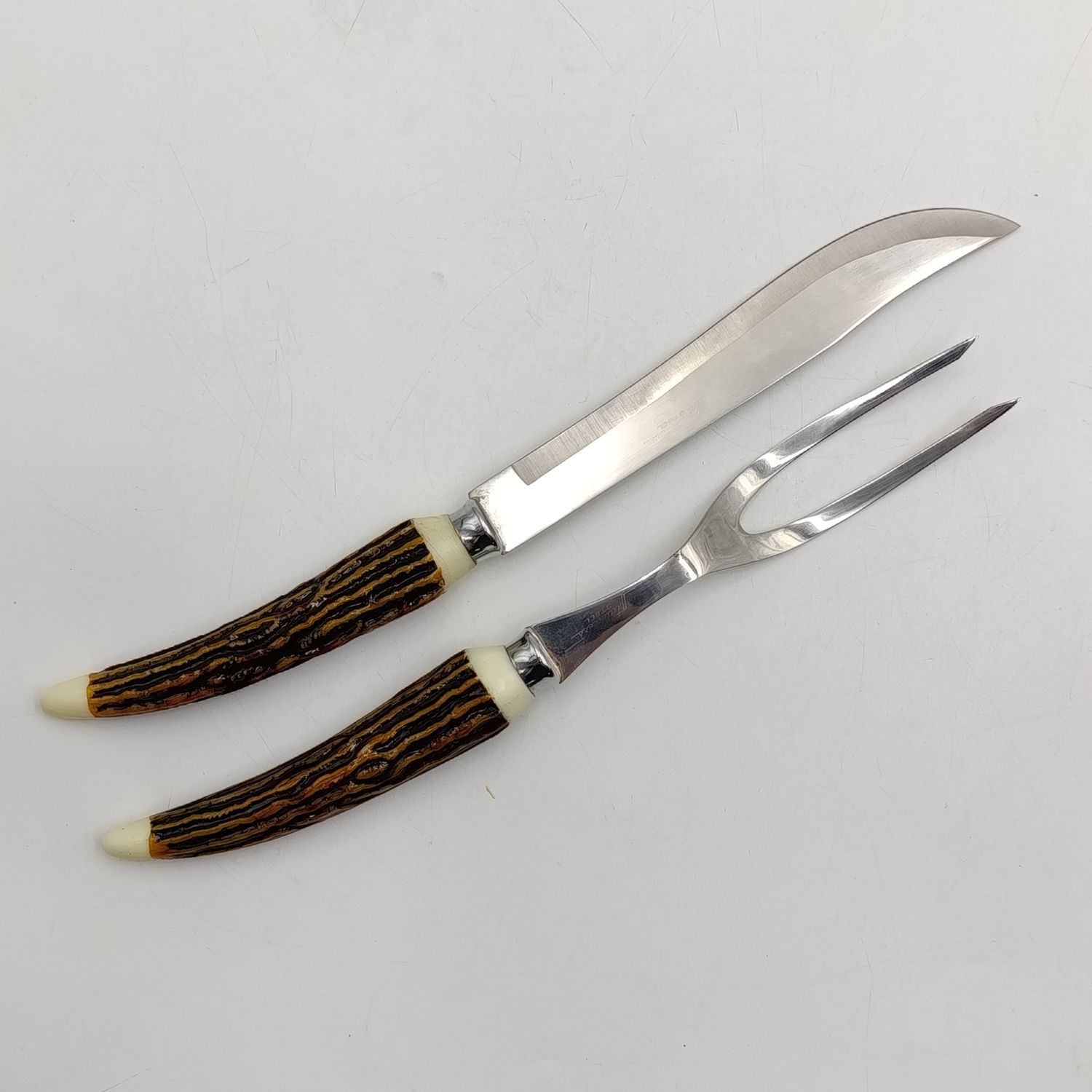 Vintage Steel meat carving for and knife with imitation horn handles