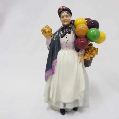 Vintage Royal Doulton `Biddy Pennyfarthing` HN1843 figurine designed by Leslie Harradine