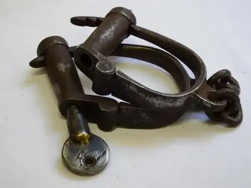 Antique Iron handcuff shackles with original key