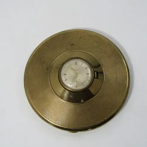 Vintage Gold coloured powder compact with manual wind watch in lid