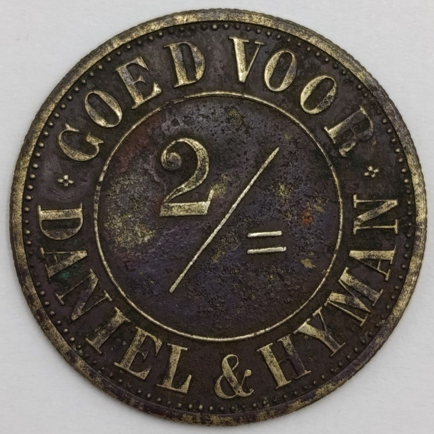 Daniel and Hyman Goed Voor 2 Shilling token with letter from National Museum