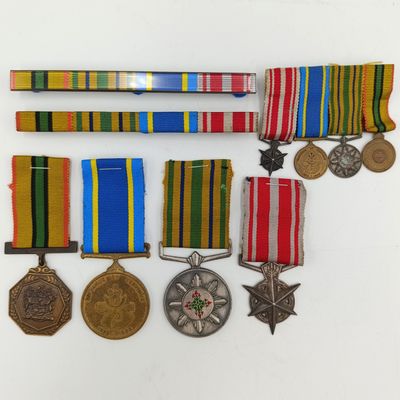 Set of 4 Police and Railway Police medals issued to Captain JJ van der Merwe - plus miniature set