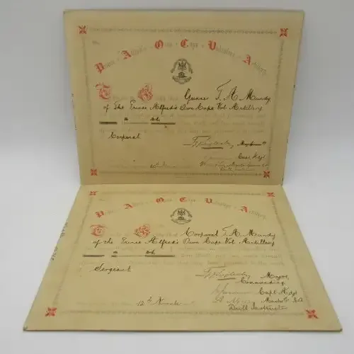 1895 Promotion certificate for TA Mundy to the rank Corporal and Sergeant