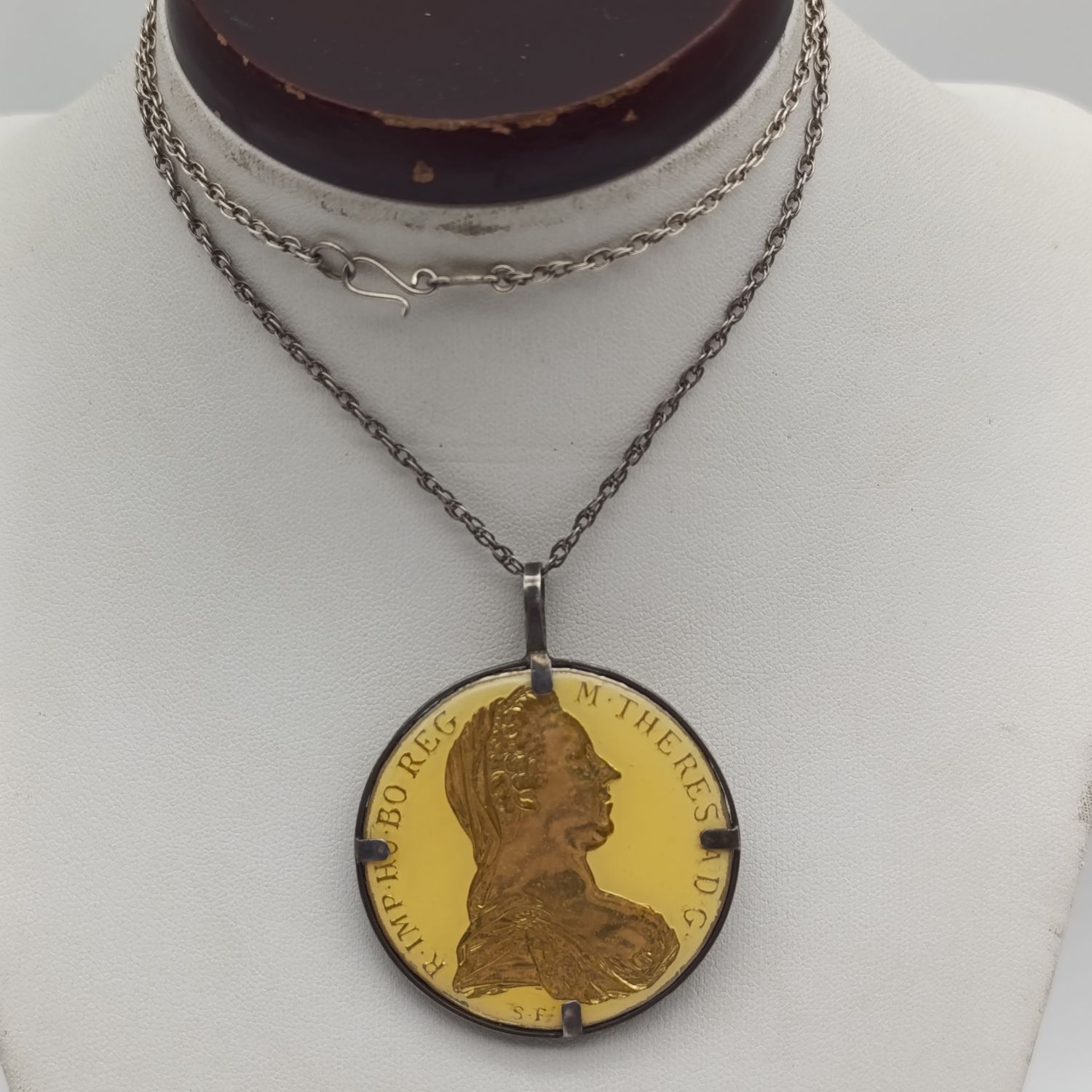 1780 Silver Maria Theresia Thaler Goldplated and epoxy in silver surround - with silver chair