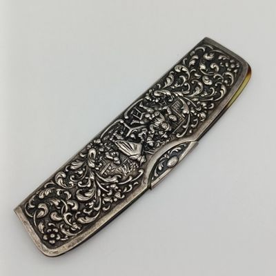 Vintage Faux tortoise shell comb with silver plated comb cover