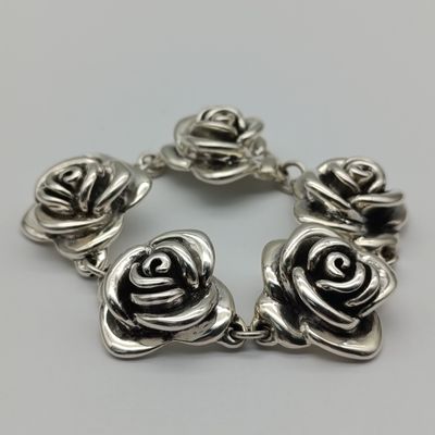 Sterling silver flower design bracelet - weight 28.2g