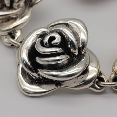 Sterling silver flower design bracelet - weight 28.2g