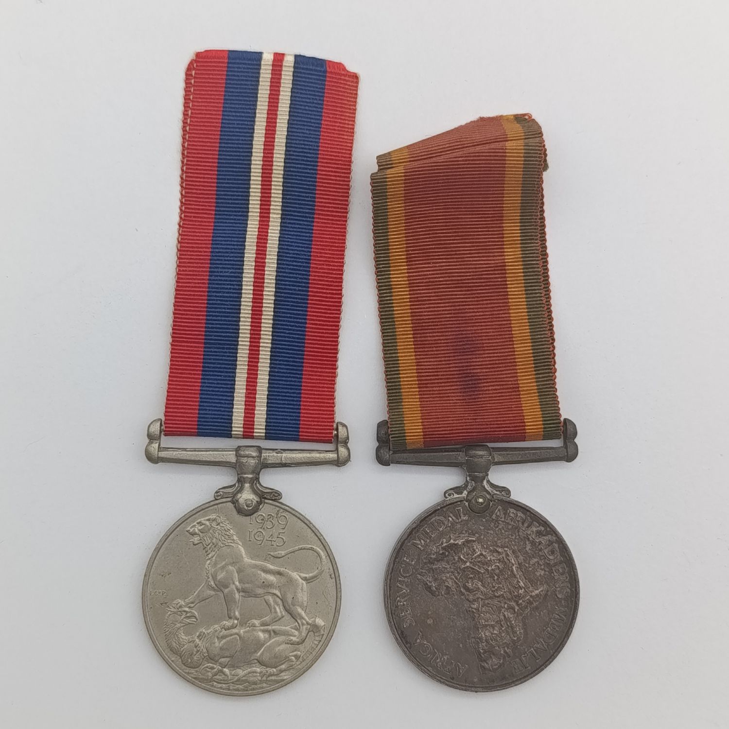 Pair of WW2 medals issued to 214152 C.J. maker
