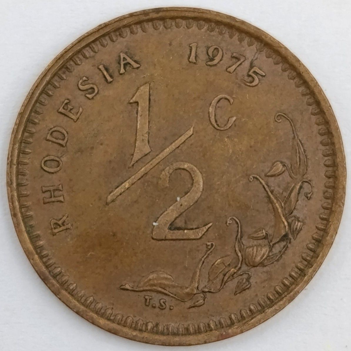 Error coin - 1975 Rhodesia 1/2 cent with die crack on &quot;5&quot; of date