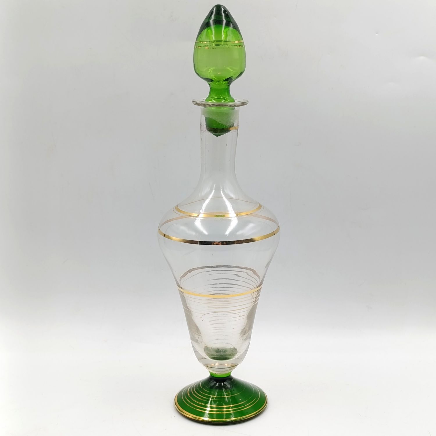 Beautiful vintage glass decanter with green glass top