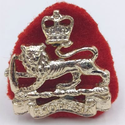 Pair of Rhodesia and Nyasaland mess dress collar badges
