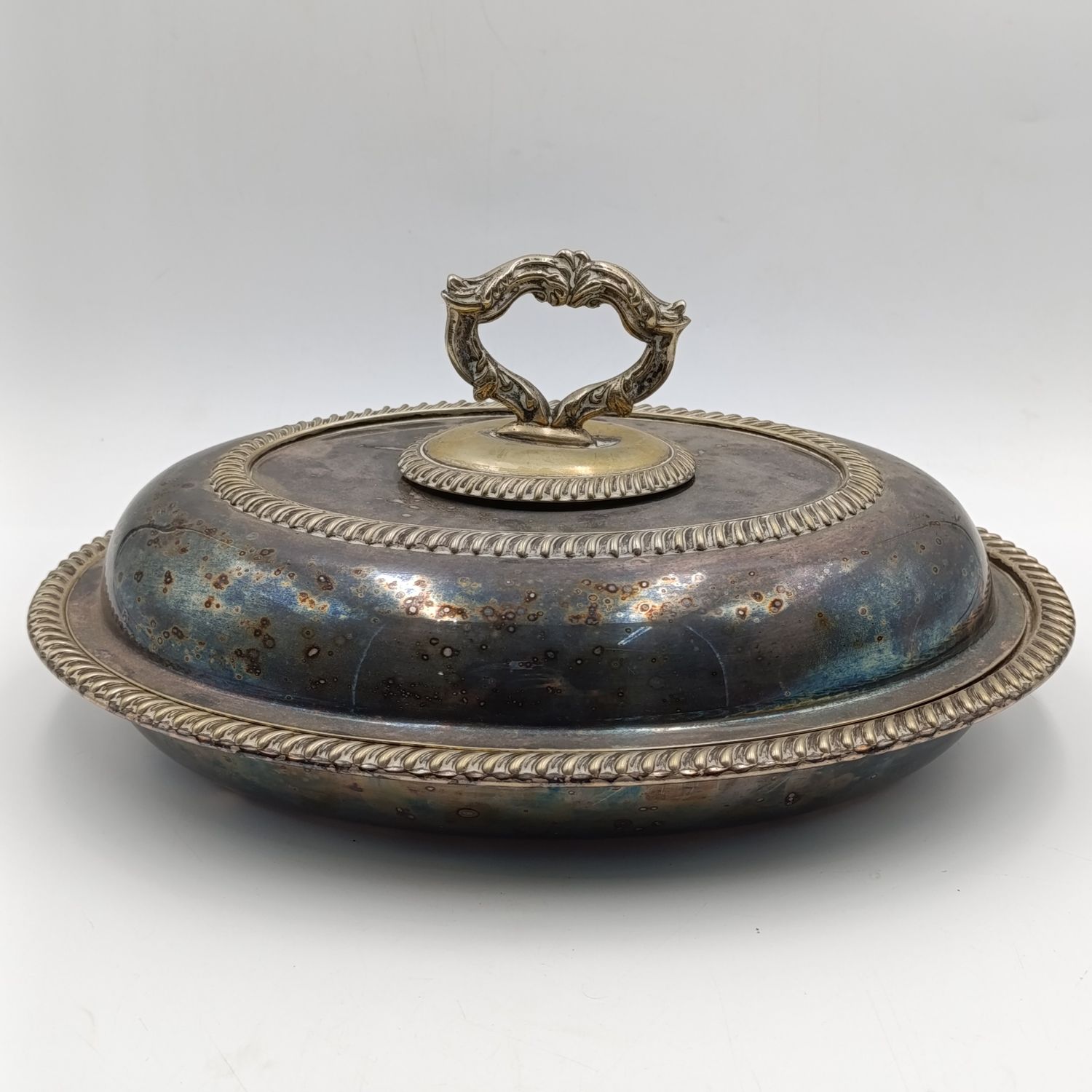 Antique silverplated oval serving dish with removable handle on lid