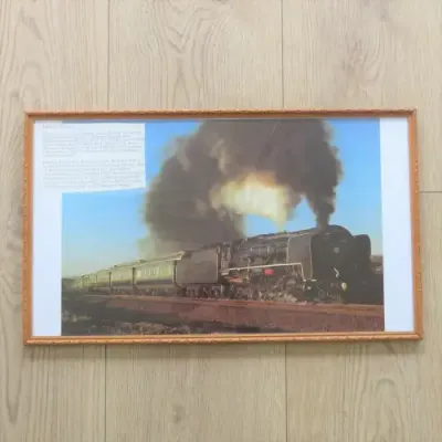 Printed picture of SA Railways Blue train with 25NC steam locomotive in frame