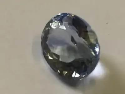 Scapolite of 9.35 carat - Oval light blue - With Gem Lab certificate