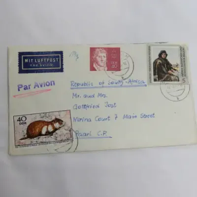 Airmail cover from Schmolln, DDR to Paarl, South Africa with Airmail tag and Par Avion ink cancel