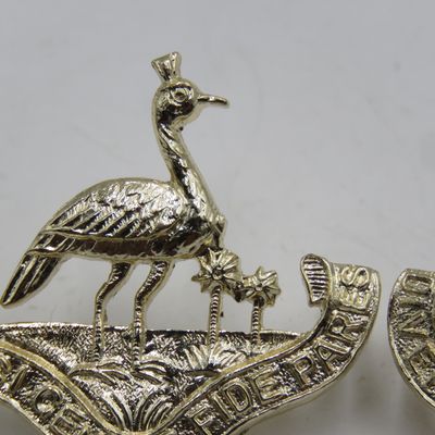 Pair of Northern Rhodesia regiment collar badges