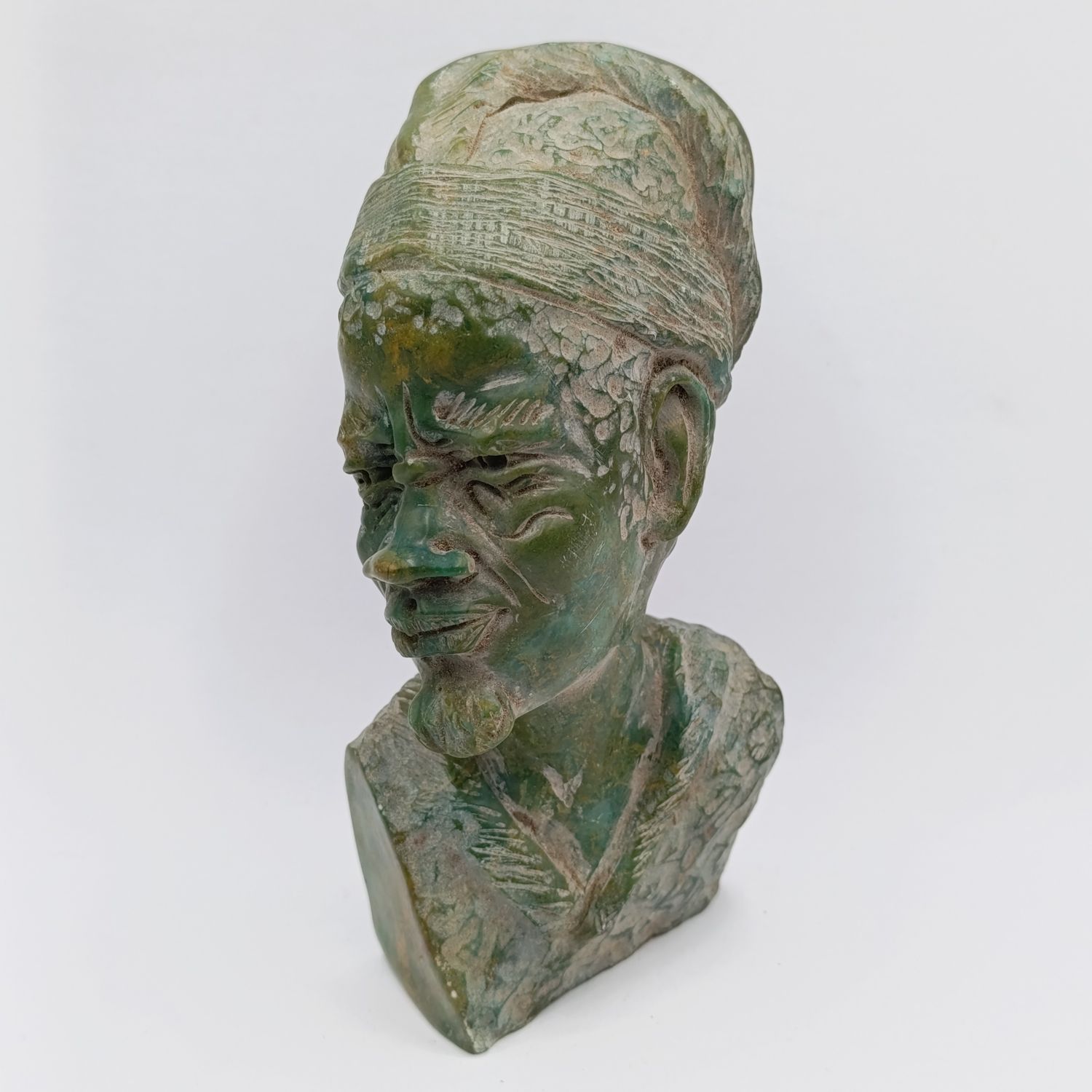 African Man green opal stone carving by Caleb Samhere