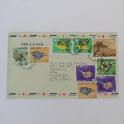Airmail cover sent from Kingston, Jamaica to Mahe, Seychelles with 9 colorful Jamaican stamps