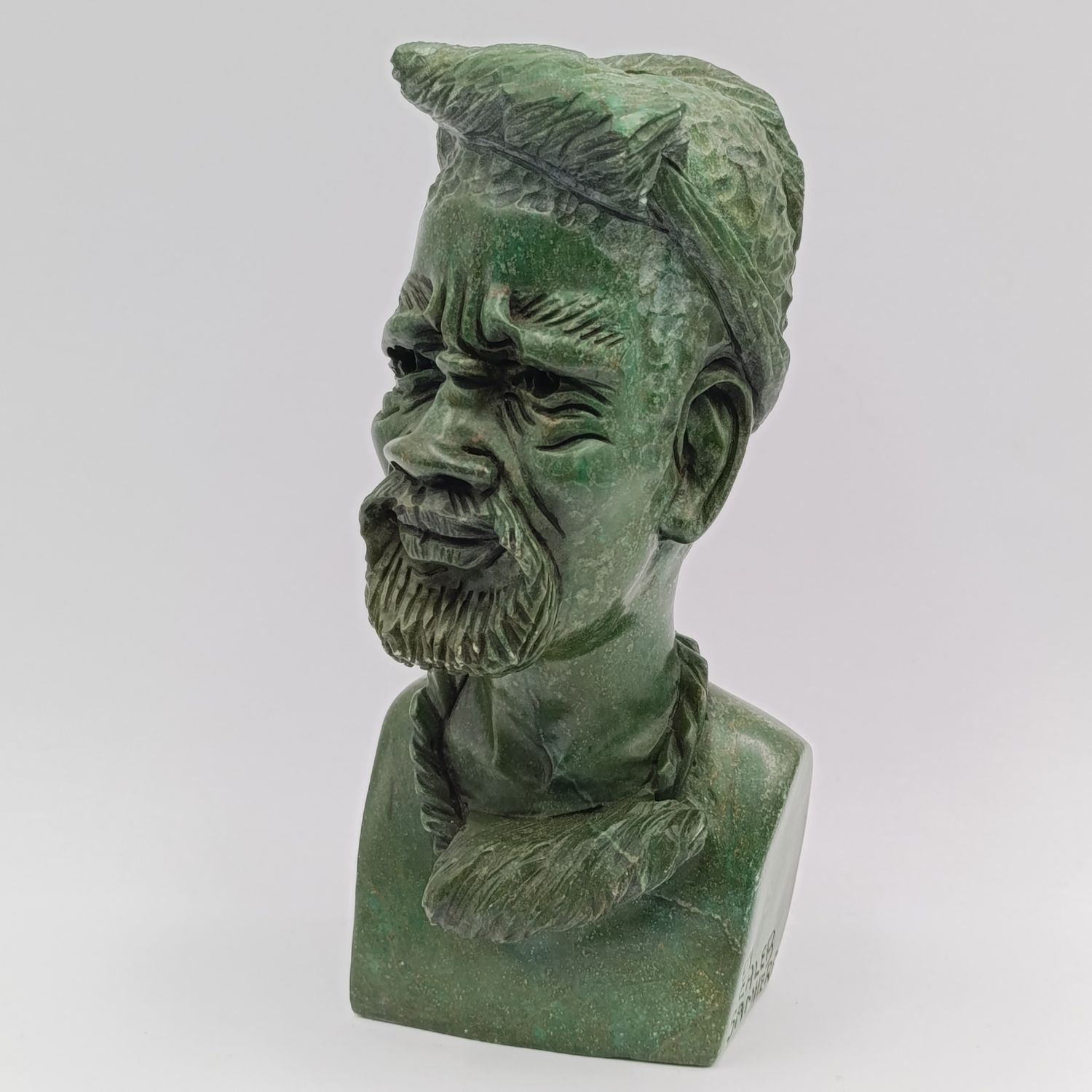African Man green opal stone carving by Caleb Samhere