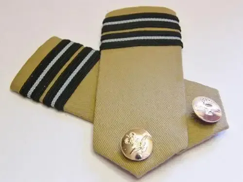 Pair of Royal Air Force tropics rank epaulettes - used in Rhodesia tropics - leather strap on back