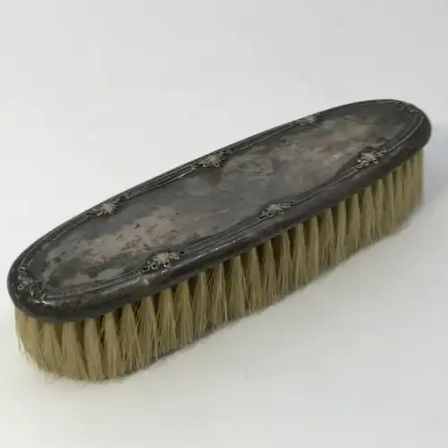 Antique silver clothing brush - hallmarked Birmingham 1912