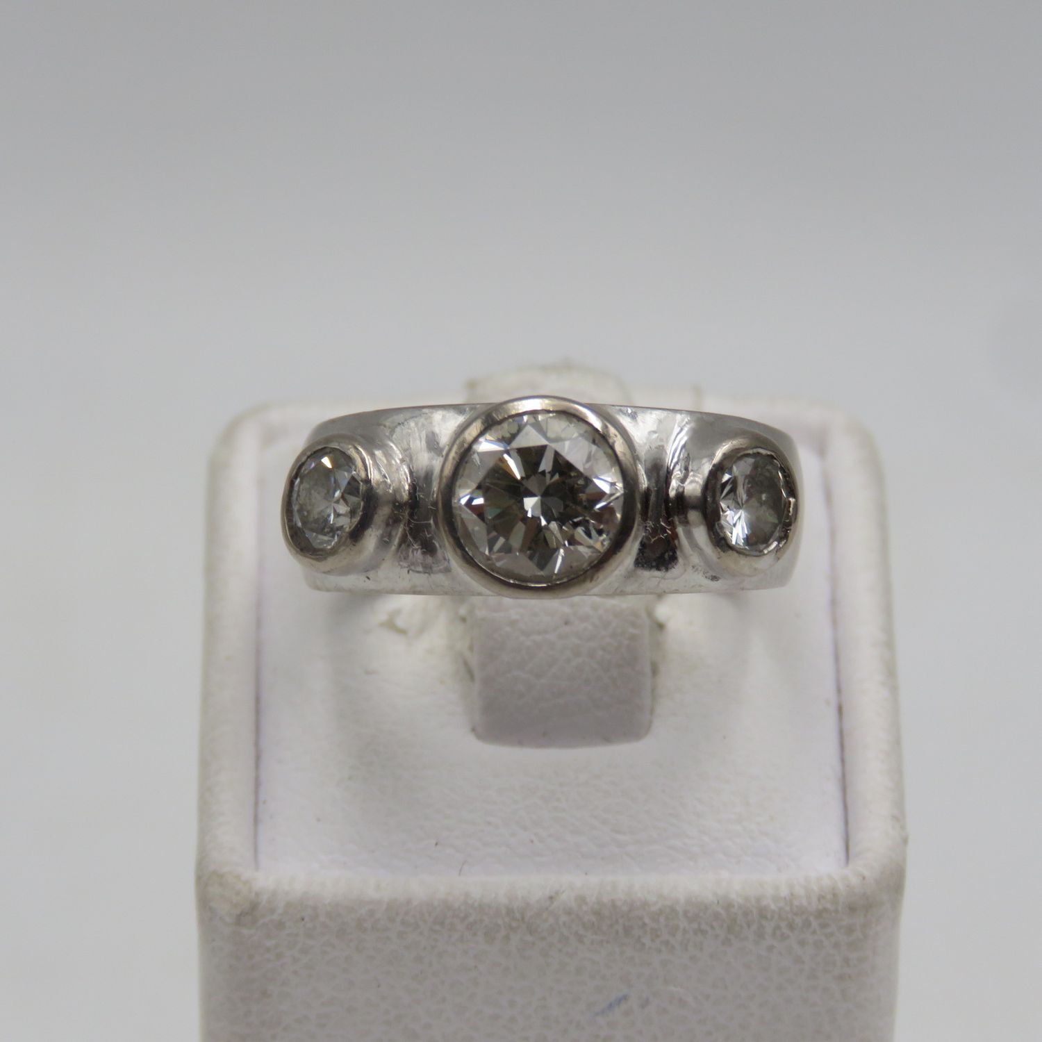 18kt White gold diamond ring with 1.2ct diamond and 2 smaller diamonds of 0.40ct each -  weighs 7.0 grams