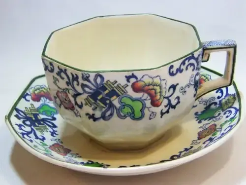 Royal Doulton Nankin octagonal tea cup and saucer - cup handle repaired and fine crack