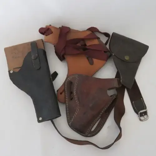 Lot of 10 leather holsters and straps for .32 and .38 revolvers