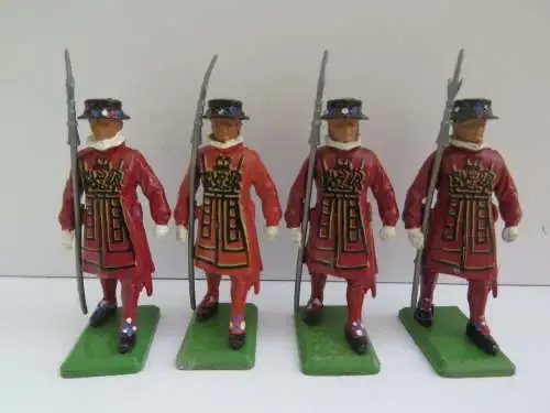 Set of 4 Britians Ltd. Beefeater lead soldiers with plastic lace