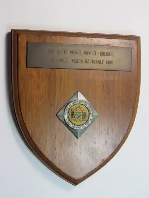 Venda National Force plaque given to Lt. Col. JS Naude