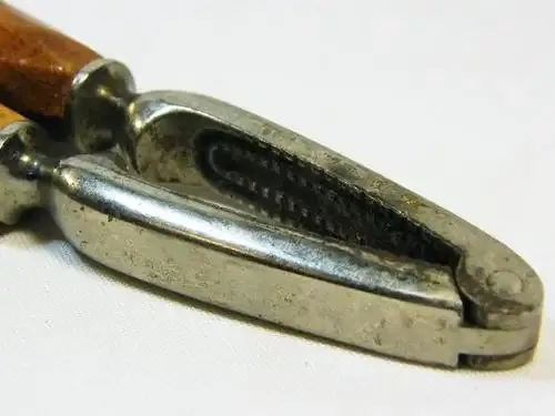 Vintage nutcracker with wooden handles - as per photo