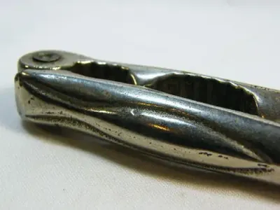 Vintage silverplated nutcracker with double opening - as per photo