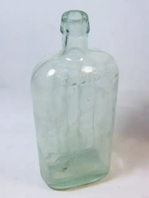 Antique Scrubs fluid ammonia bottle