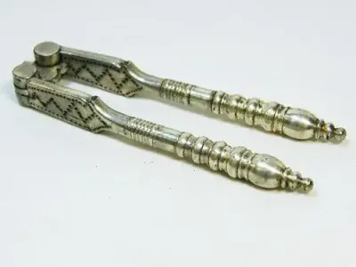 Antique silver plated nutcracker - marked Silbert