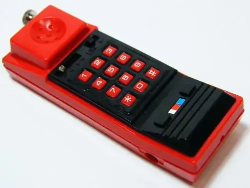 Vintage cellphone shaped piezo pocket lighter - not working - as per photo