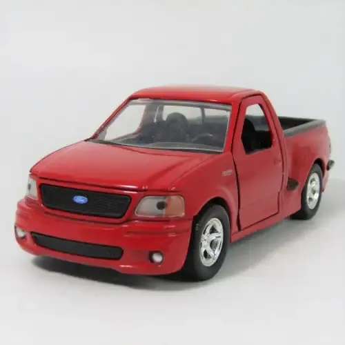 Jada Toys 1999 F-150 SVT Lighting model car - scale 1/32