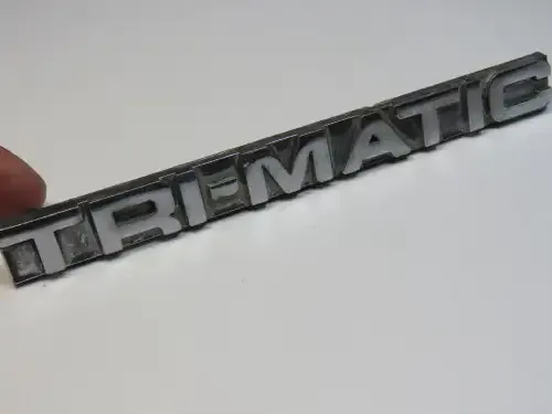 CHEV Tri-Matic metal badge - One broken pin