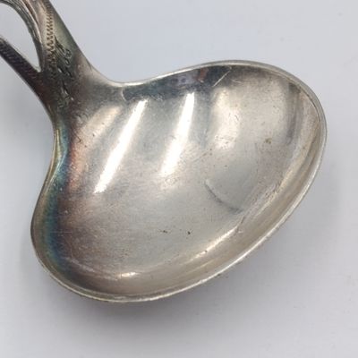 Antique Scottish silverplated tea caddy spoon with thistle design
