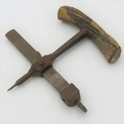 Vintage leather circle cutting tool with bone handle
