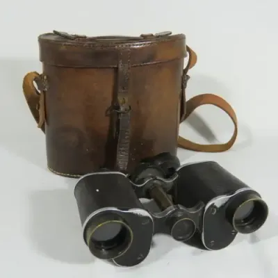 Antique E. Burmester Cape Town binoculars in leather case - One eye piece missing